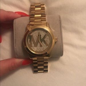 MK gold watch